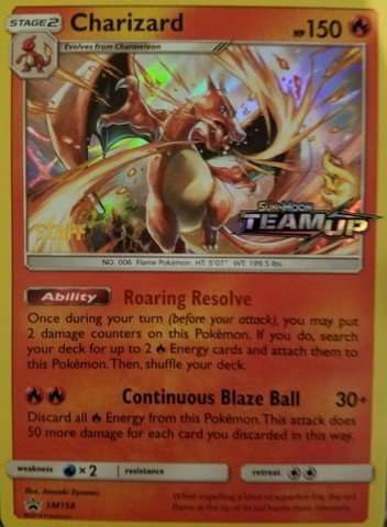 Charizard - SM158 - Staff Prerelease Promo - SM Black Star Promo (Español)
